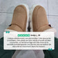Plush lined winter slippers with a non-slip sole and a supportive footbed
