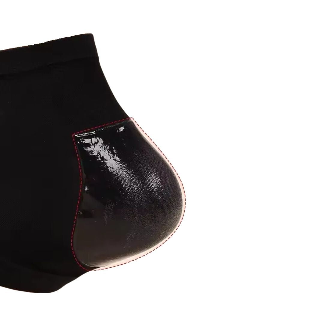 Gel heel protector cup slipped over the heel inside the shoe