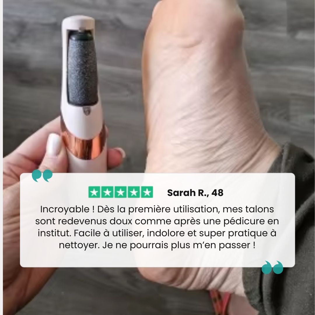 Pink handheld electric callus remover with a rotating roller head for the heel