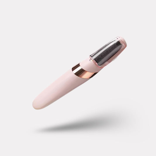 Pink handheld electric callus remover with a rotating roller head for the heel
