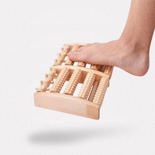 Ridged massage roller rolled underfoot to release plantar tension