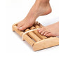 Ridged massage roller rolled underfoot to release plantar tension