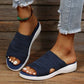 Gray wedge sandals for women with a padded footbed and an adjustable buckle