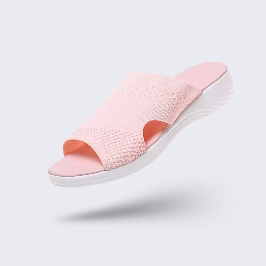 Gray wedge sandals for women with a padded footbed and an adjustable buckle