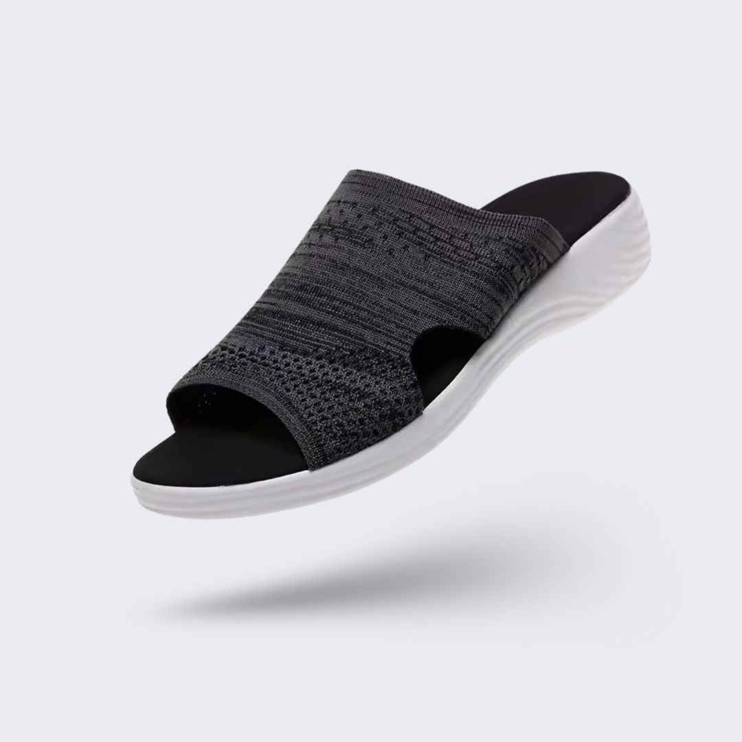 Gray wedge sandals for women with a padded footbed and an adjustable buckle