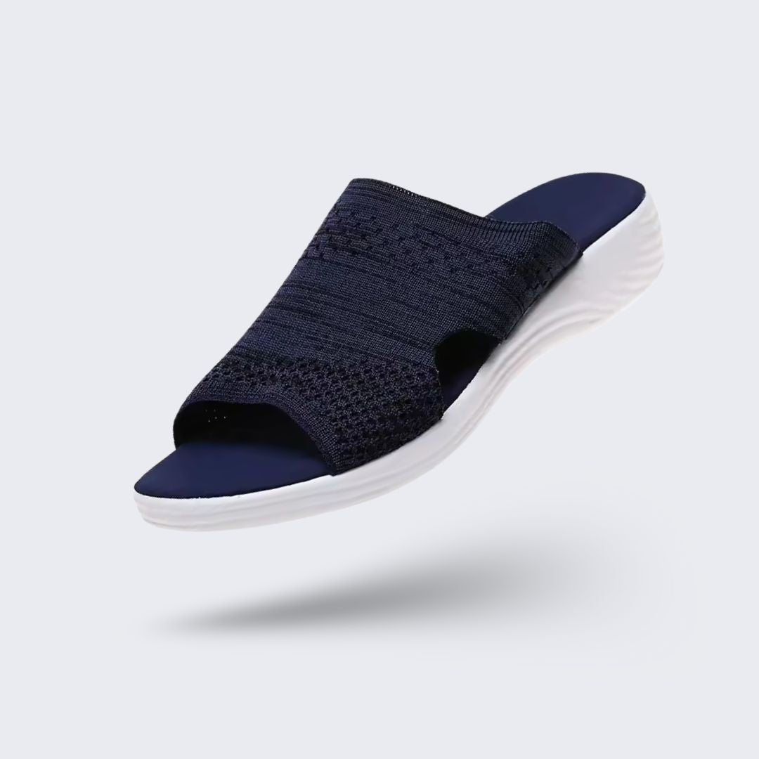 Gray wedge sandals for women with a padded footbed and an adjustable buckle