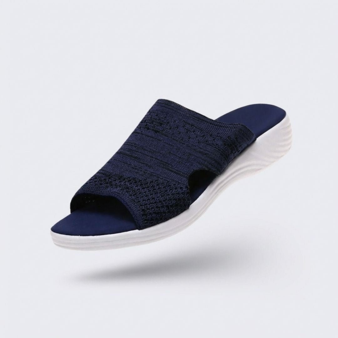 Blue, gray and pink wedge sandals with a supportive contoured footbed and raised heel