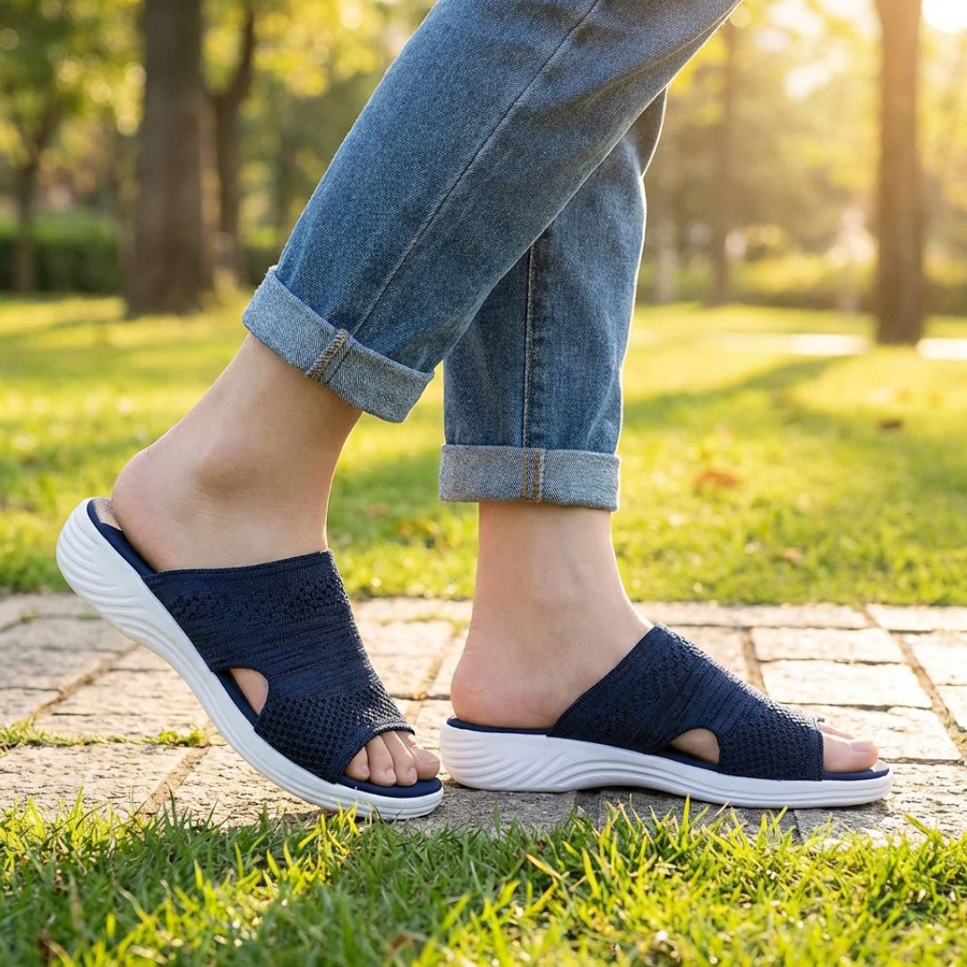 Blue, gray and pink wedge sandals with a supportive contoured footbed and raised heel