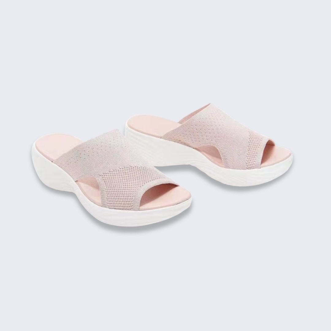Blue, gray and pink wedge sandals with a supportive contoured footbed and raised heel