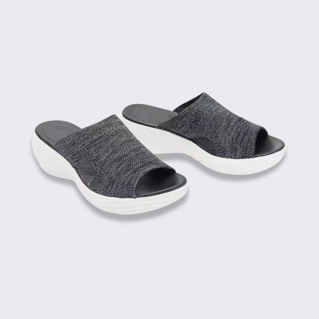 Blue, gray and pink wedge sandals with a supportive contoured footbed and raised heel