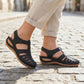 Summer wedge sandals with wide straps and an arched footbed, in black, blue, brown and red
