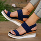 Beige wedge sandals for women with a raised heel and arch supporting footbed