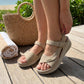 Orthopedic wedge sandals with a raised heel and cushioned footbed, in khaki, gray and blue