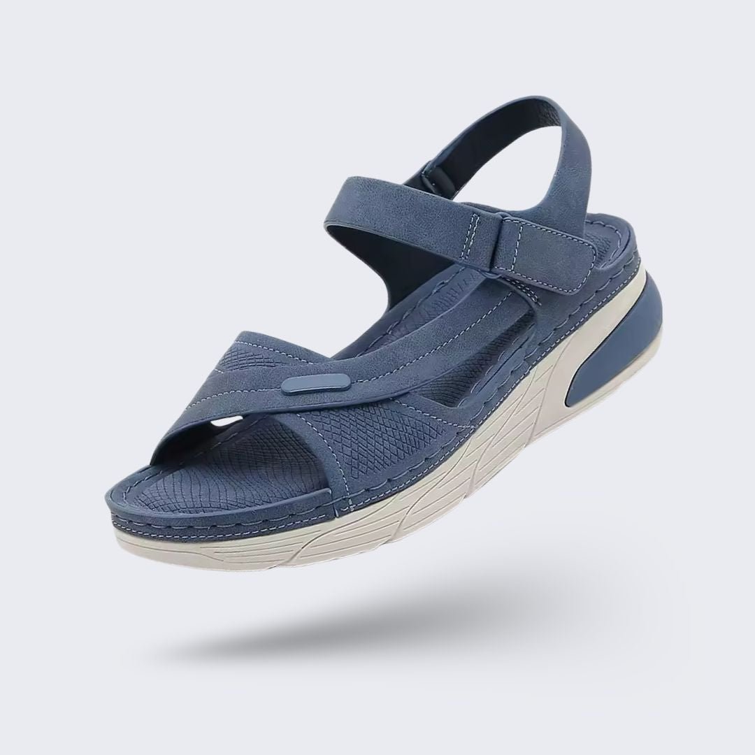 Orthopedic wedge sandals with a raised heel and cushioned footbed, in khaki, gray and blue