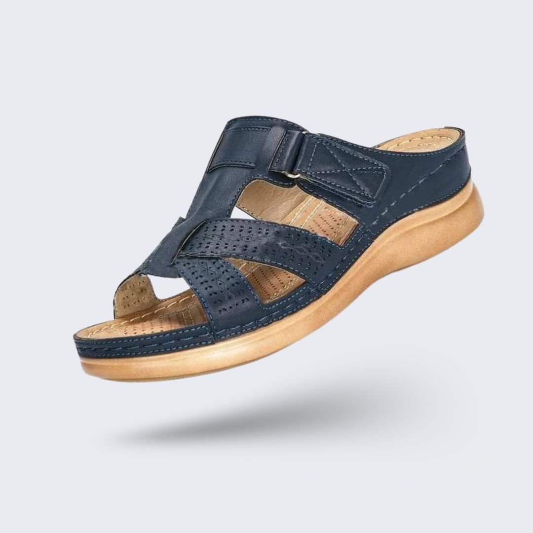 Orthopedic sandals on a raised wedge heel with a supportive contoured footbed