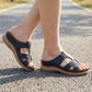 Orthopedic sandals on a raised wedge heel with a supportive contoured footbed