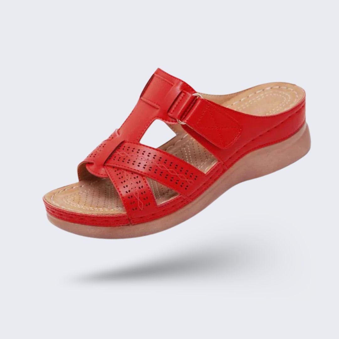 Orthopedic sandals on a raised wedge heel with a supportive contoured footbed