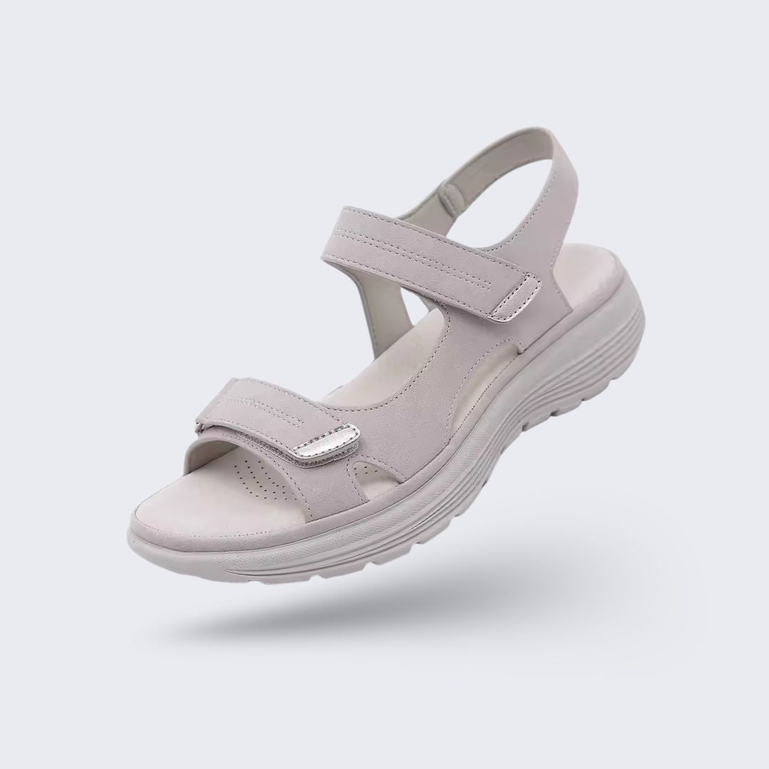 Orthopedic support sandals in blue, black and gray with a raised arch and a deep heel cup