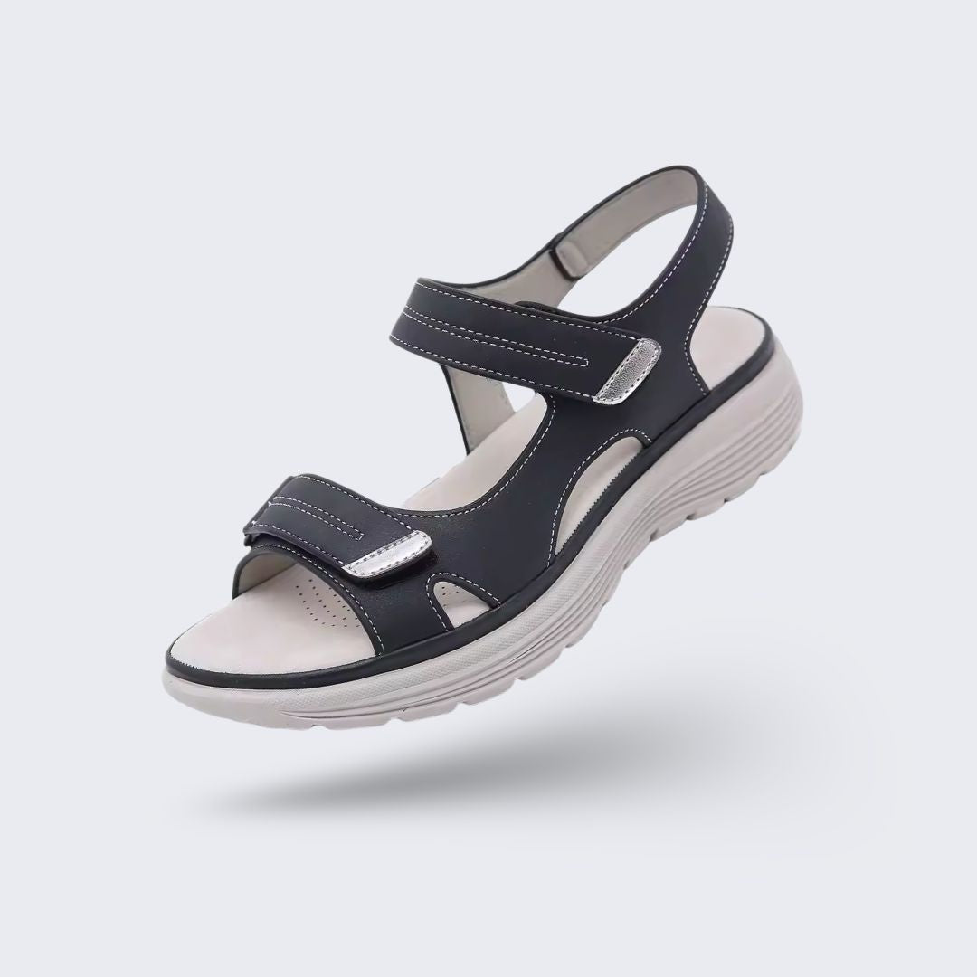 Orthopedic support sandals in blue, black and gray with a raised arch and a deep heel cup