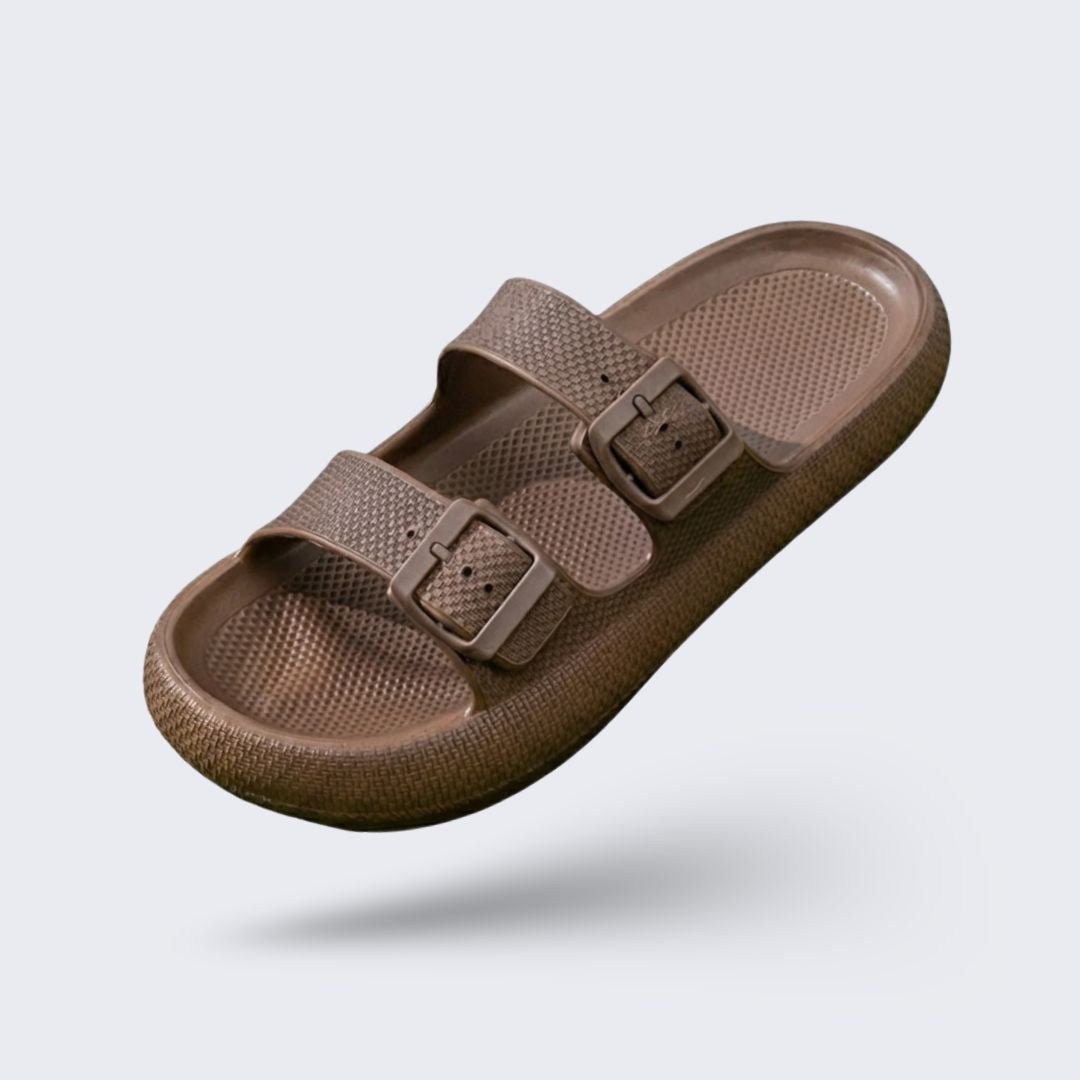 Orthopedic sandals with adjustable buckle straps over the instep and a contoured footbed
