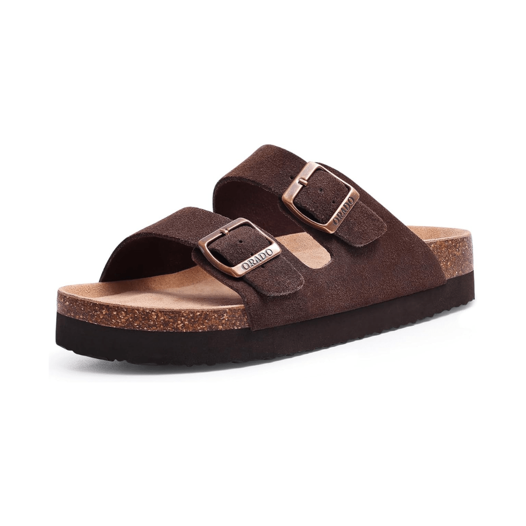 Cream sandals with two buckle straps and a contoured cork footbed
