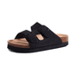Cream sandals with two buckle straps and a contoured cork footbed