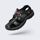 Brown leather orthopedic sandals with buckled straps and a contoured footbed