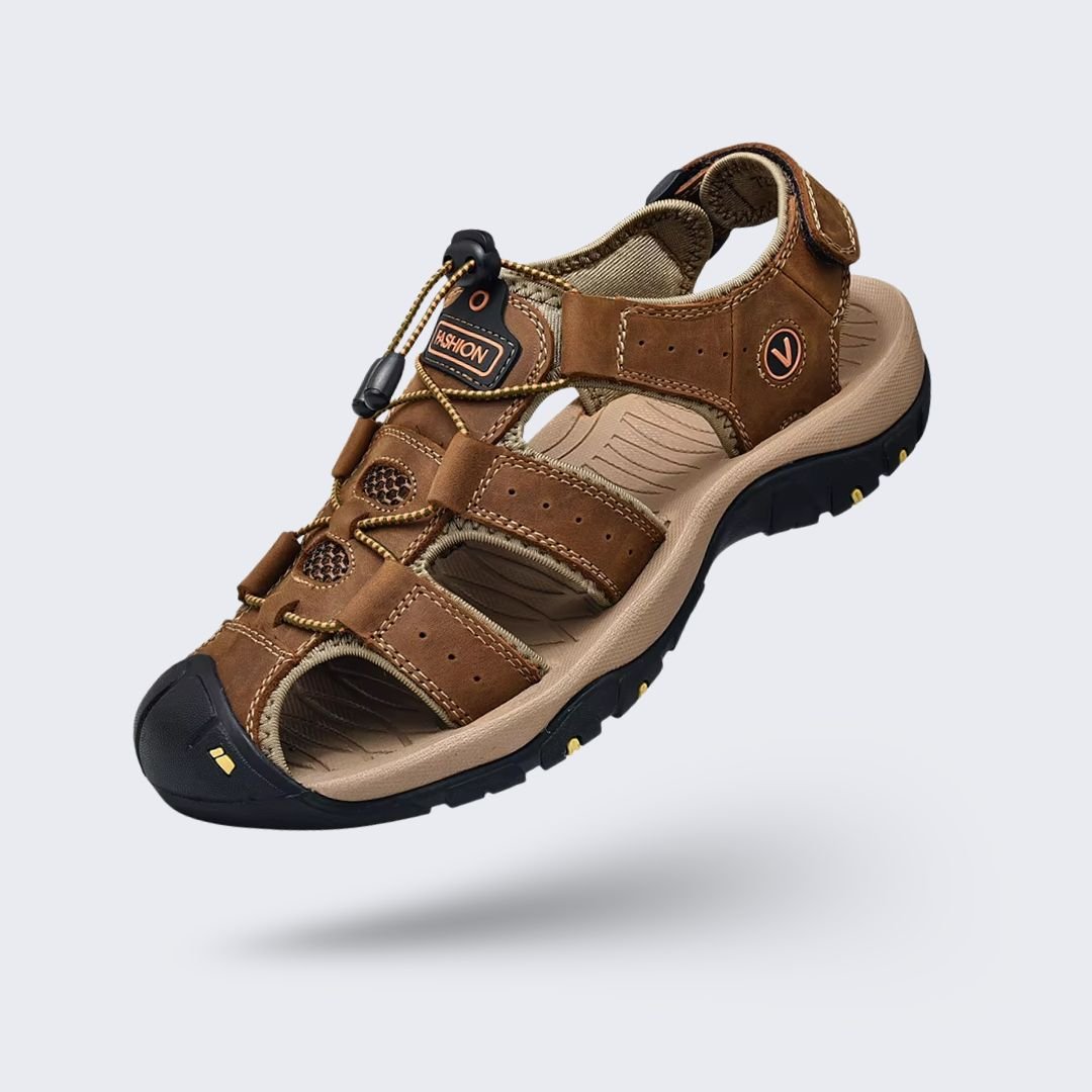 Brown leather orthopedic sandals with buckled straps and a contoured footbed