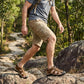 Brown leather orthopedic sandals with buckled straps and a contoured footbed