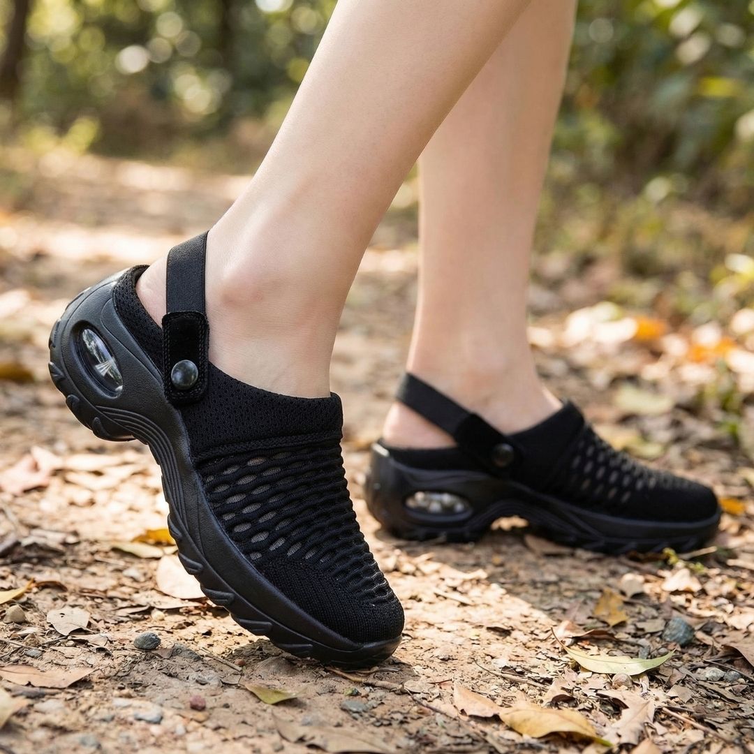 Lightweight orthopedic slide sandals with a cushioned contoured footbed