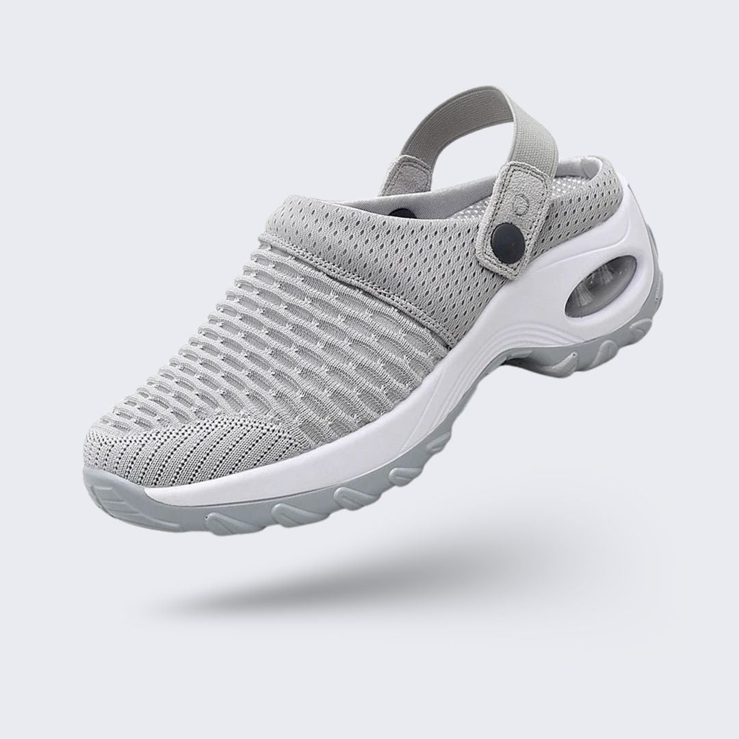 Lightweight orthopedic slide sandals with a cushioned contoured footbed