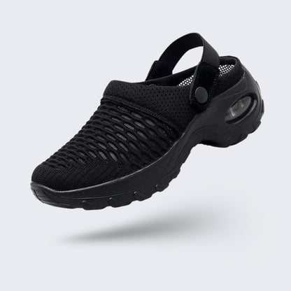 Lightweight orthopedic slide sandals with a cushioned contoured footbed