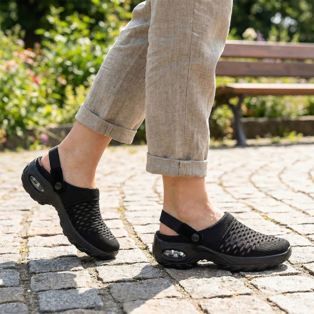 Lightweight orthopedic slide sandals with a cushioned contoured footbed