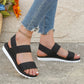 Flat orthopedic sandals with a discreet arch in the footbed, in caramel, black and white