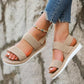 Flat orthopedic sandals with a discreet arch in the footbed, in caramel, black and white