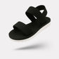 Flat orthopedic sandals with a discreet arch in the footbed, in caramel, black and white