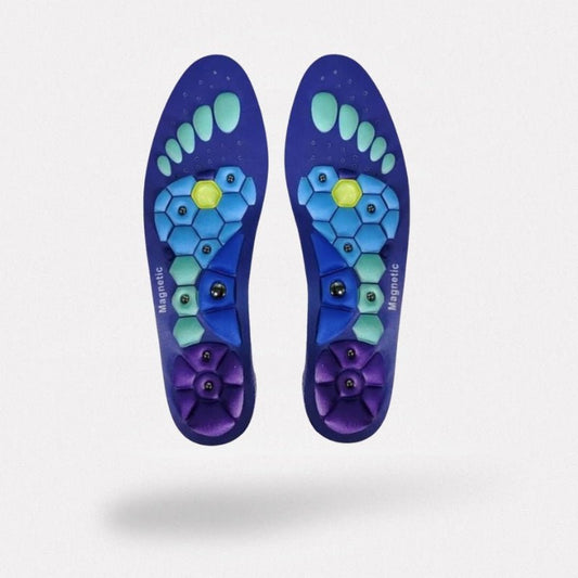 Blue and red acupressure insoles with raised nubs that press key points under the foot