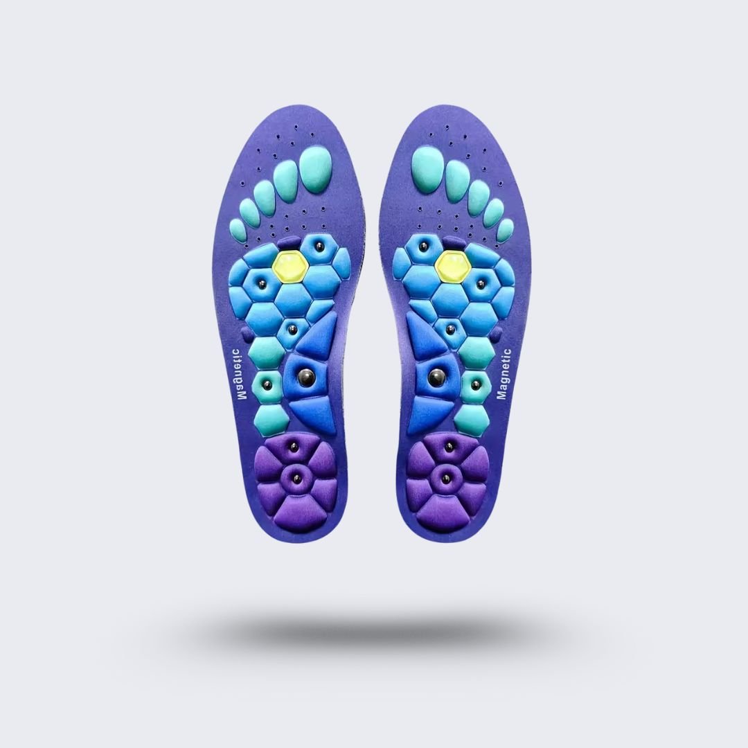 Blue and red acupressure insoles covered with raised massage nubs, placed inside the shoe