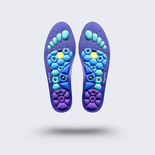 Blue and red acupressure insoles covered with raised massage nubs, placed inside the shoe