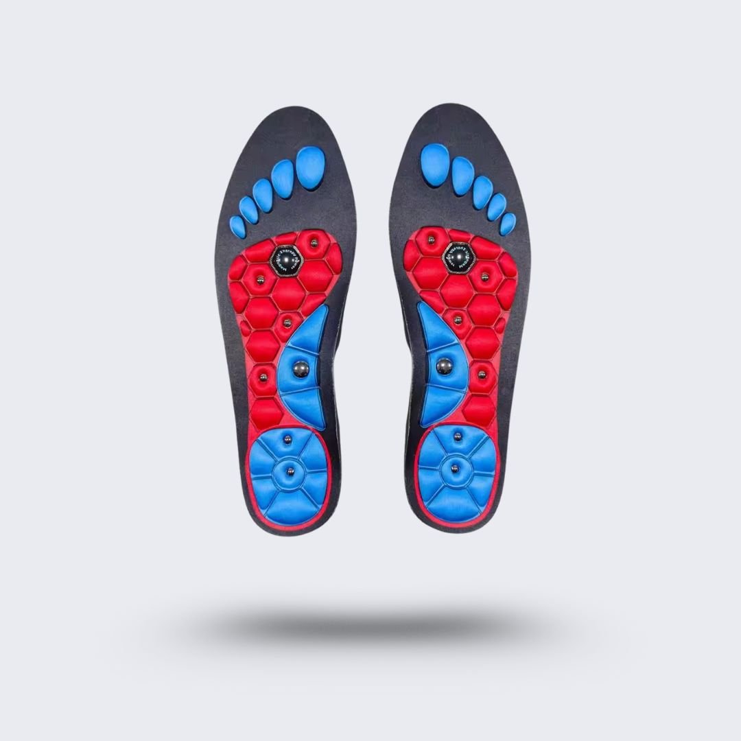 Blue and red acupressure insoles covered with raised massage nubs, placed inside the shoe