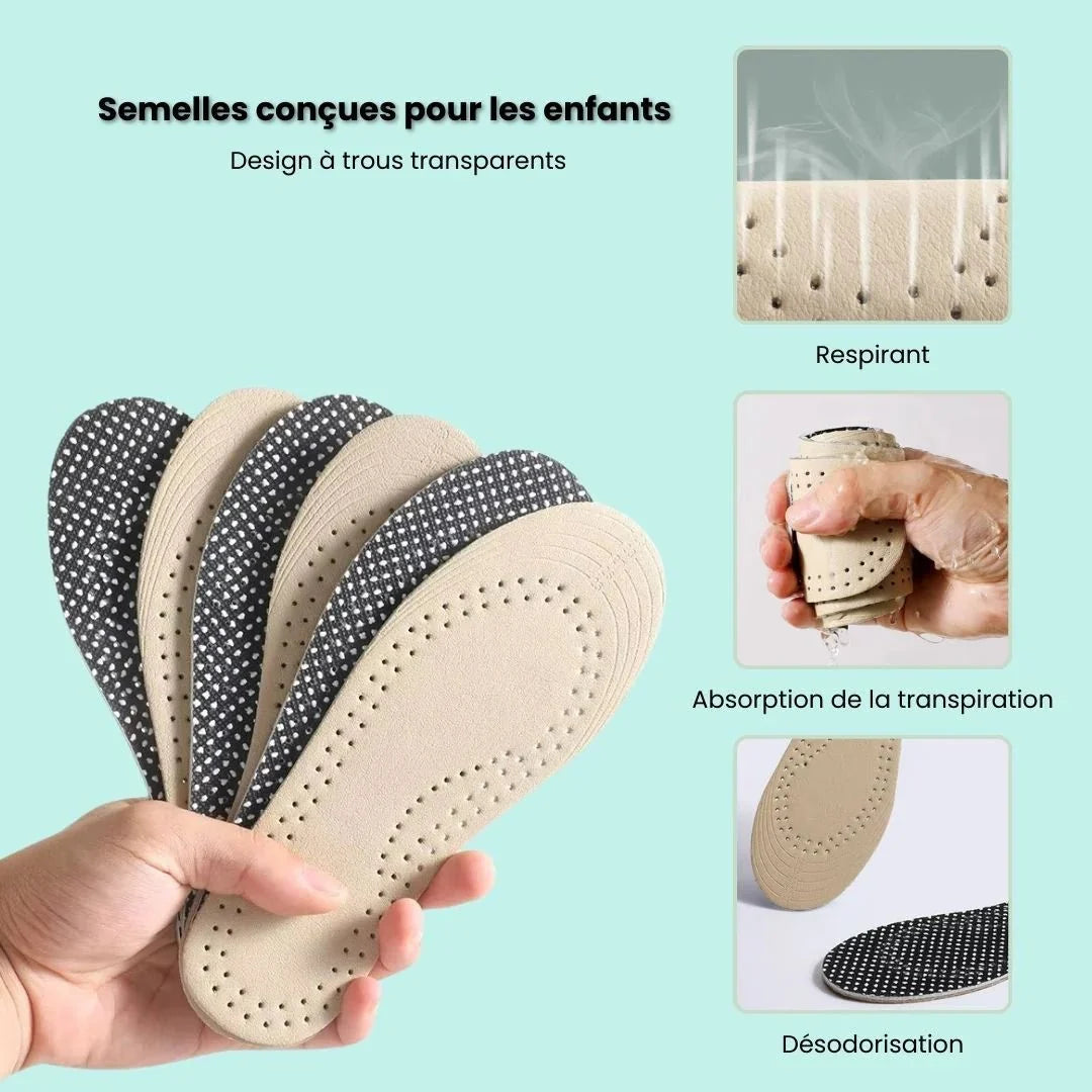 Pair of breathable leather insoles cut to fit inside children's shoes