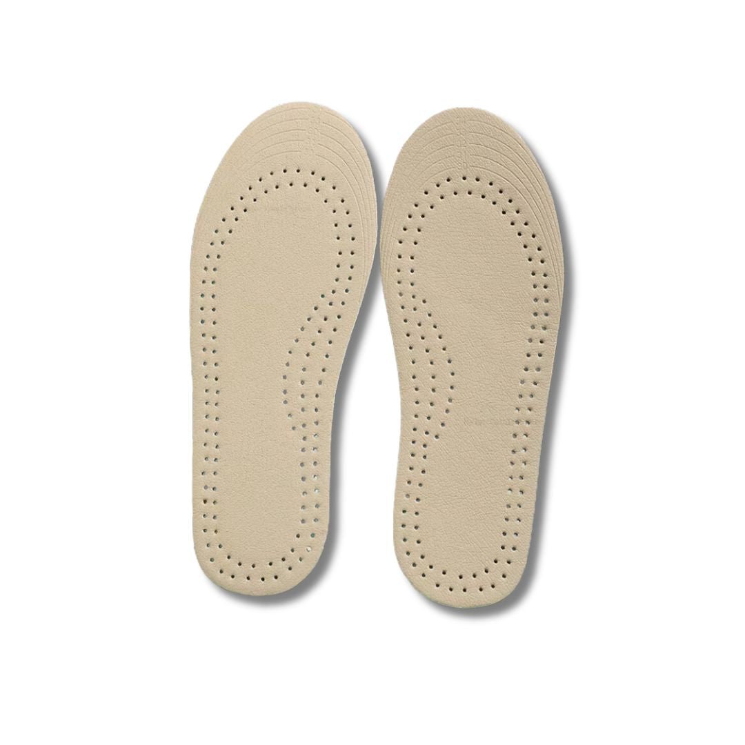 Pair of breathable leather insoles cut to fit inside children's shoes
