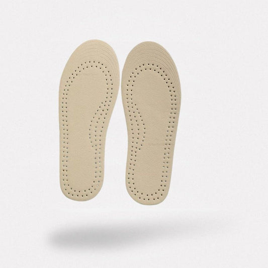 Pair of breathable leather insoles cut to fit inside children's shoes