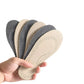 Pair of breathable leather insoles cut to fit inside children's shoes