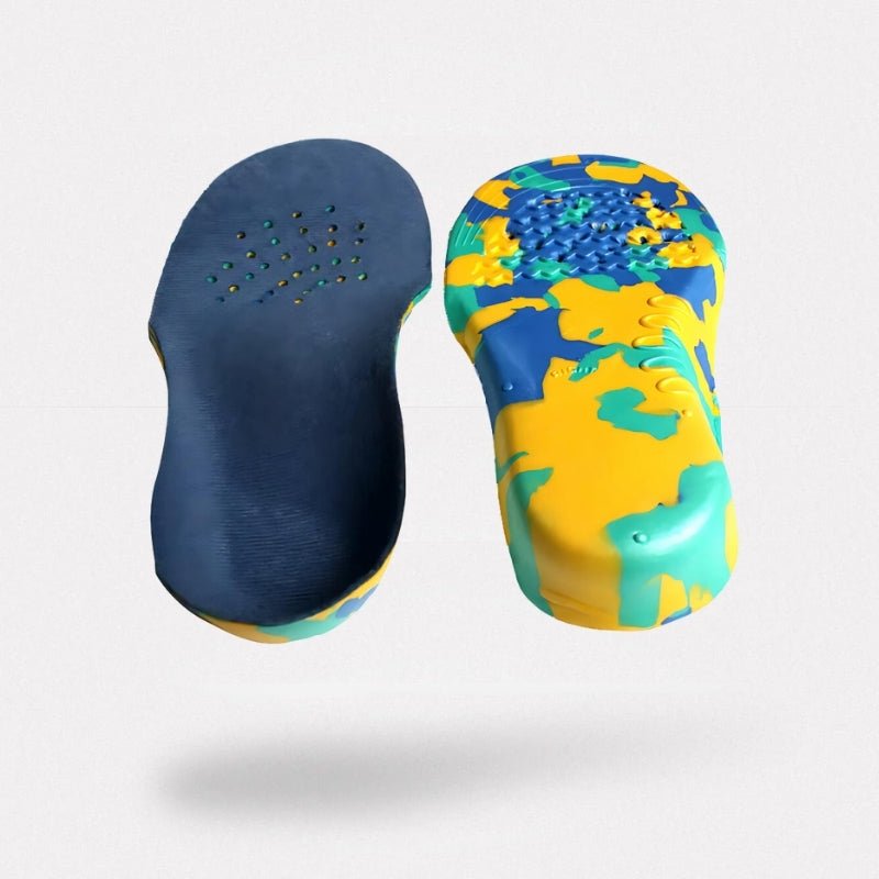 Kids orthopedic insoles with a raised arch, sized to fit inside children's shoes