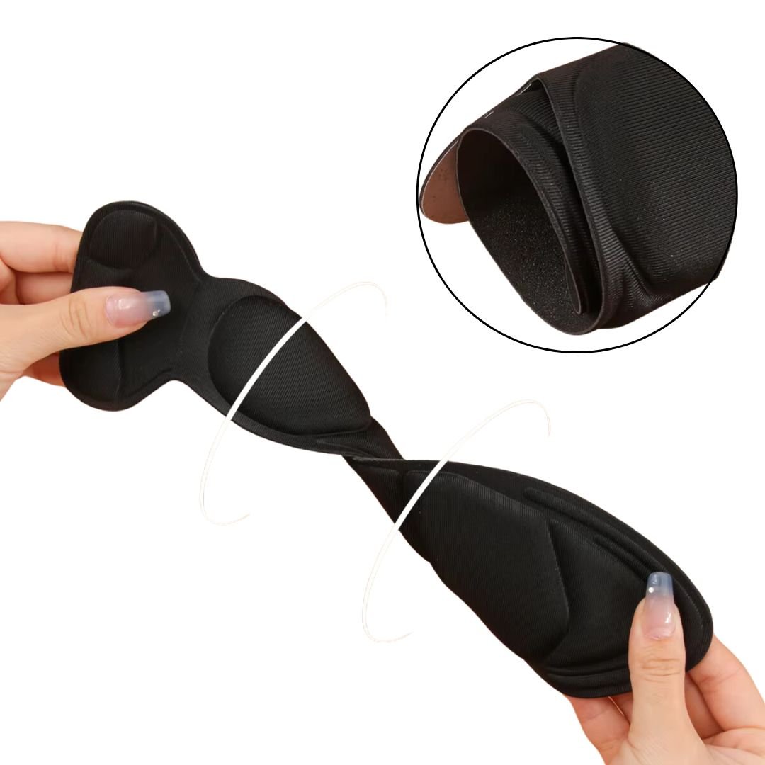 Slim nude and black insoles that cushion the ball of the foot inside high heels