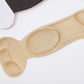 Slim nude and black insoles that cushion the ball of the foot inside high heels