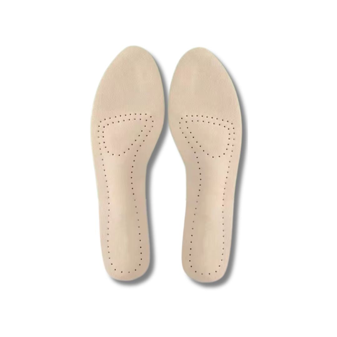 Nude leather half insoles placed in high heels under the ball of the foot
