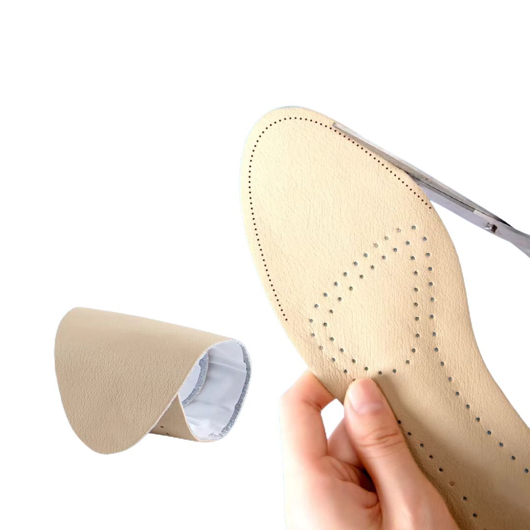 Nude leather half insoles placed in high heels under the ball of the foot