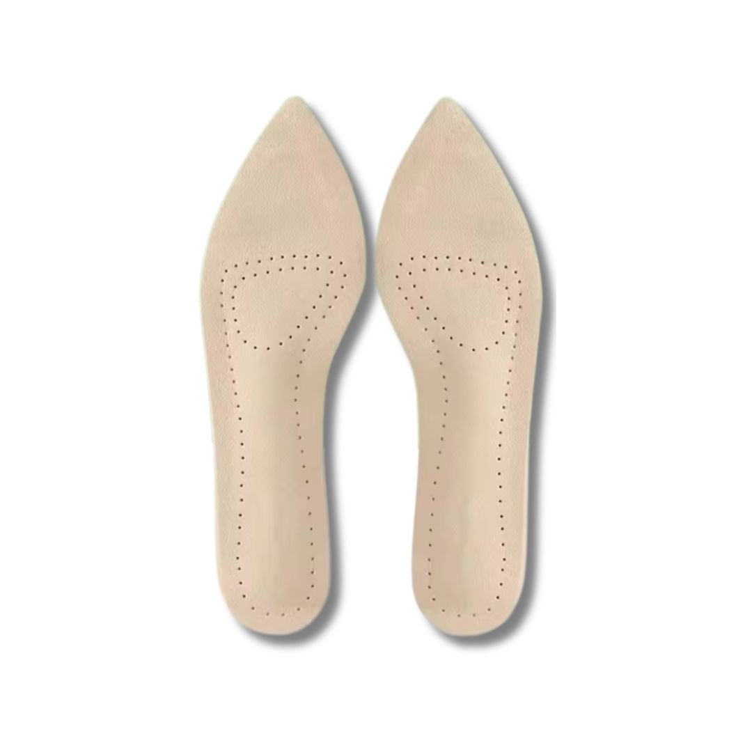 Nude leather half insoles placed in high heels under the ball of the foot